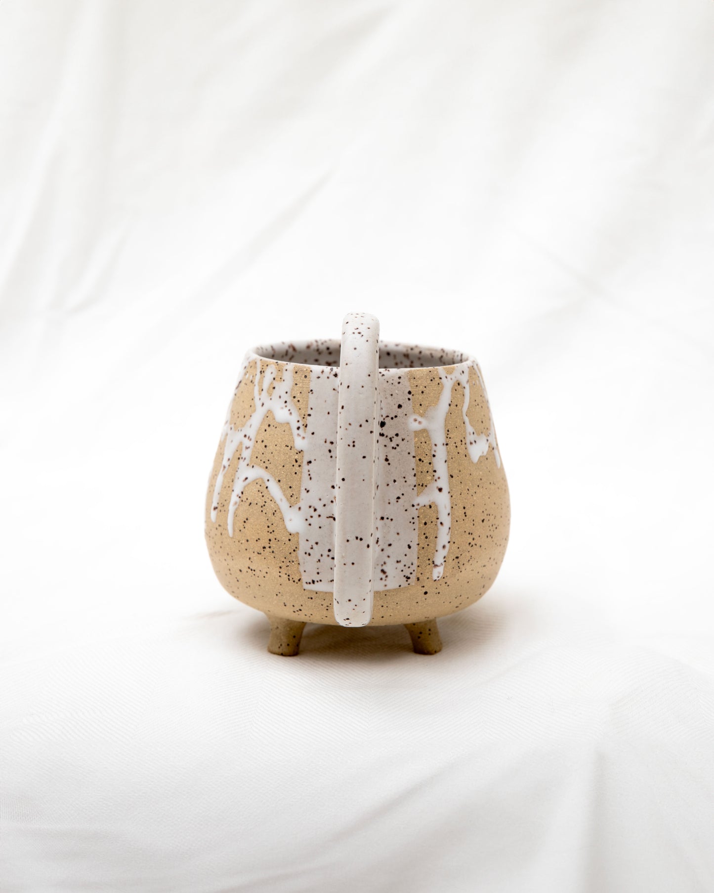 Speckled Stoneware Mug with Ghost and Drip Pattern